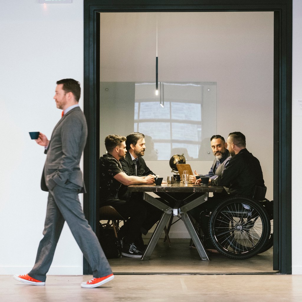 Diverse people in a meeting about charity grants